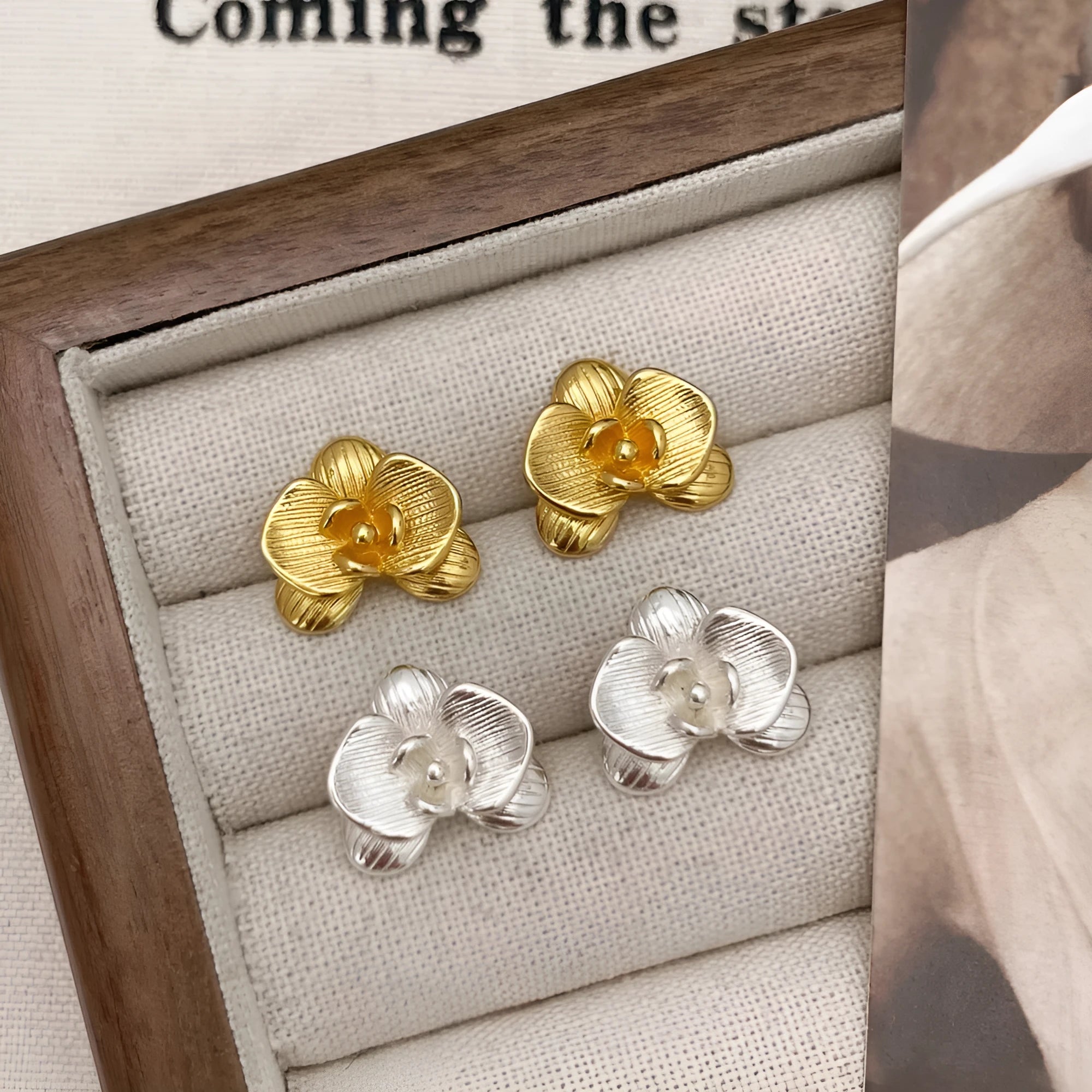 Retro style flower earrings with petal detailing in gold or silver electroplated finish on copper
