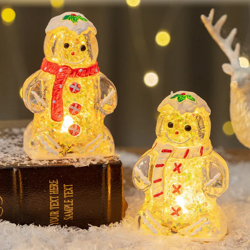 Glowing plastic gingerbread man Christmas ornament with red scarf, showing modern design and compact size.