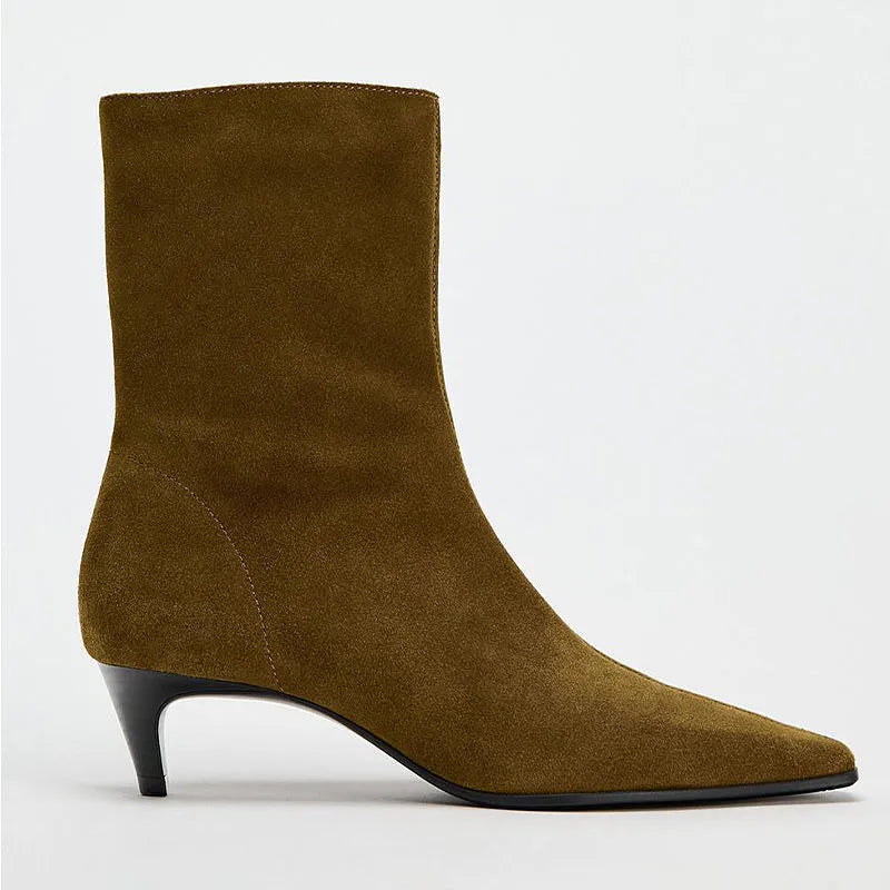 Brown women's square toe ankle boots with a side zipper and a kitten heel on a waterproof platform sole.
