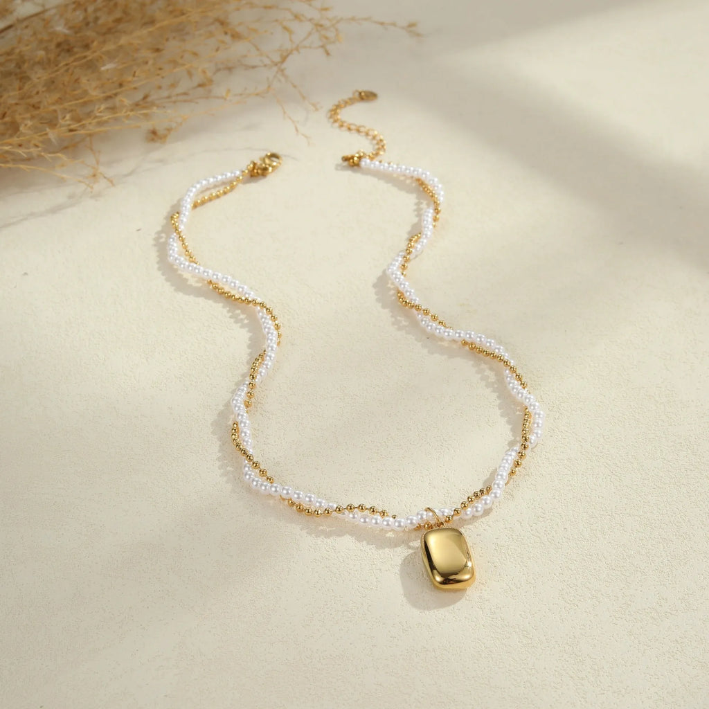 Double-layer pearl necklace with geometric pendant, stainless steel regular chain, gold or steel electroplated finish, 18K