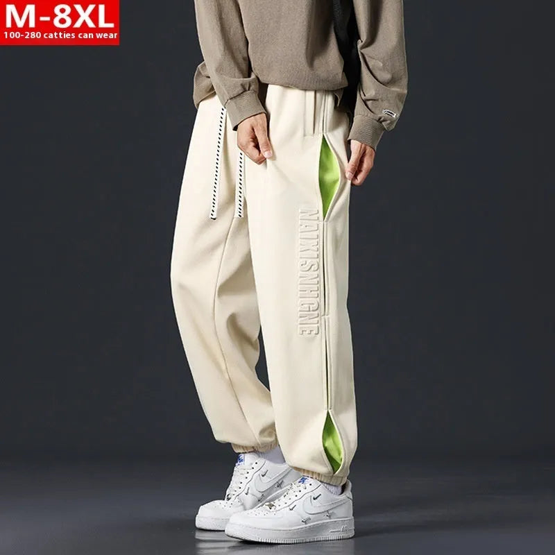 Men's black ankle banded trousers with stitching detail and cotton micro-elastic fabric