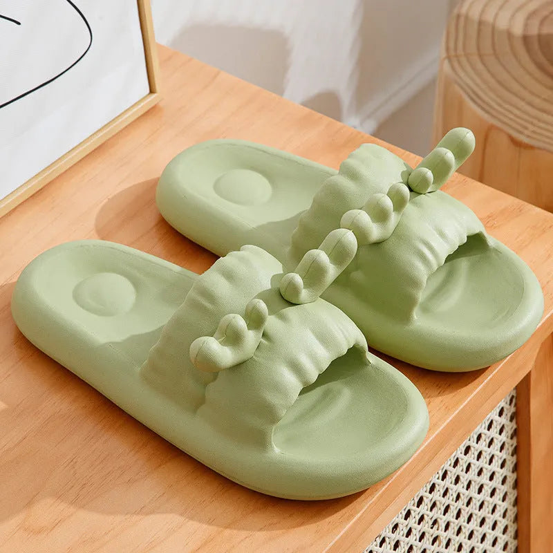 White deer horn pattern EVA flip-flop slippers with hollow-out design on a bathroom floor
