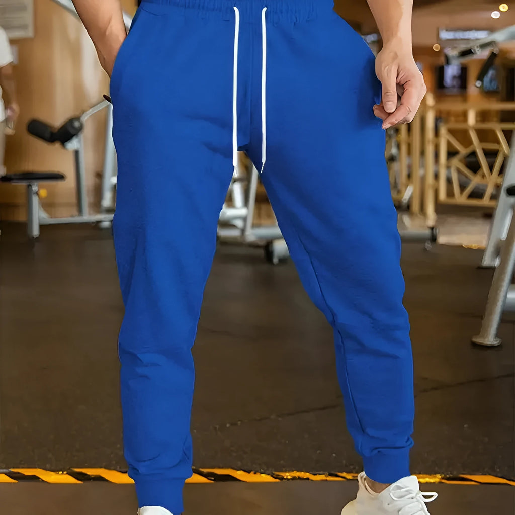 Men's loose-fit linen-style casual trousers with an elastic drawstring waist, shown in a neutral colour.