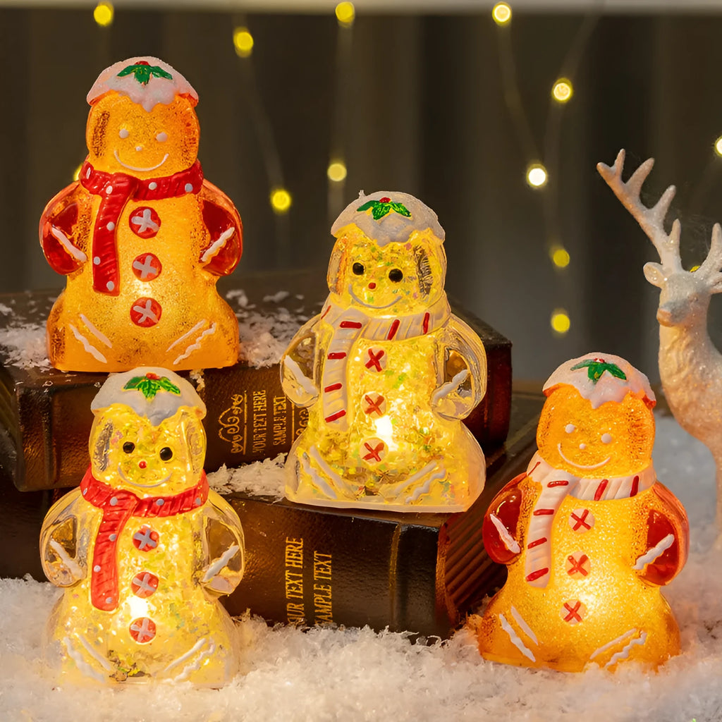 Glowing plastic gingerbread man Christmas ornament with red scarf, showing modern design and compact size.