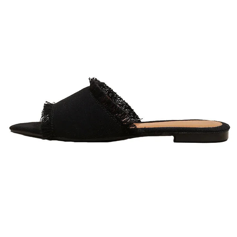 Women's denim slippers with tassel decoration in apricot colour with leather lining