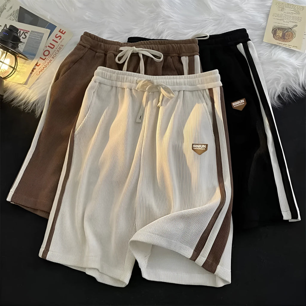 Versatile polyester sports shorts in black, apricot, and dark brown for casual summer couple wear