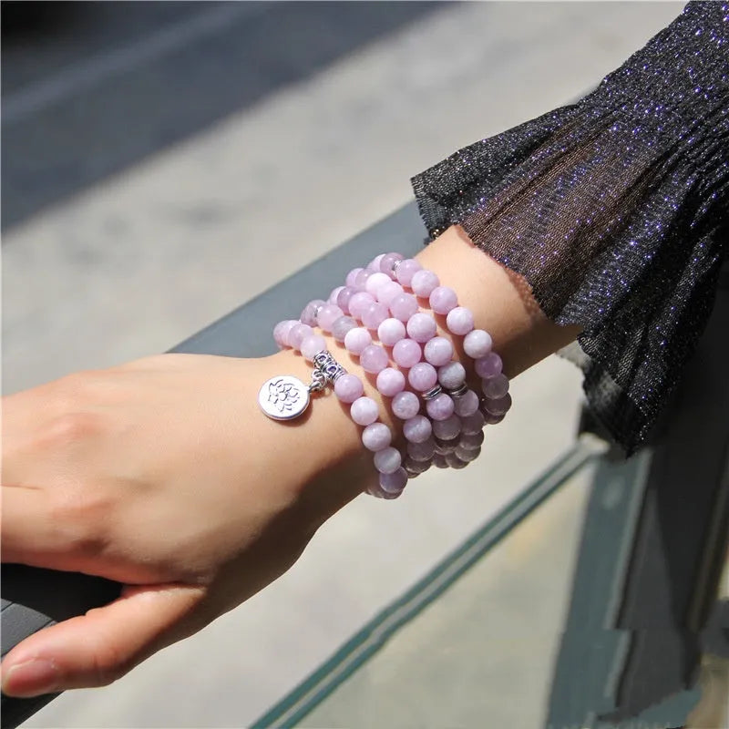 Natural stone women's bracelet with geometric lotus design shown in one of eight available colours