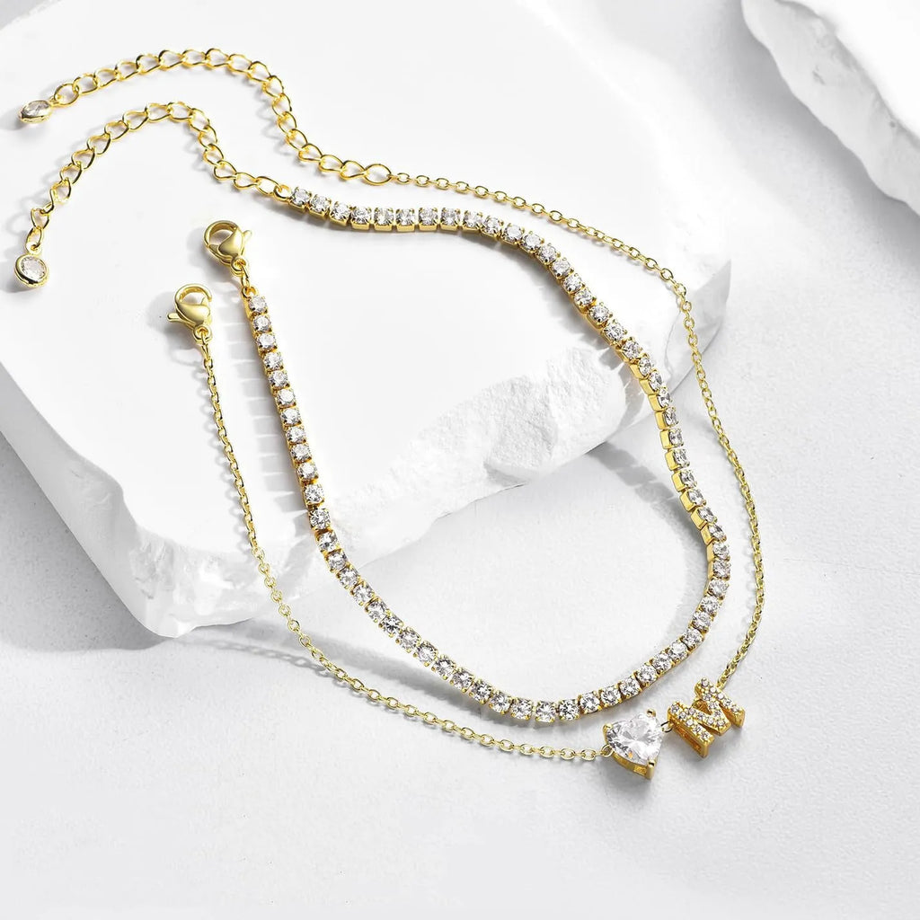 Copper initial anklet with zircon letter and double ring design, available in bead zircon or claw chain zircon