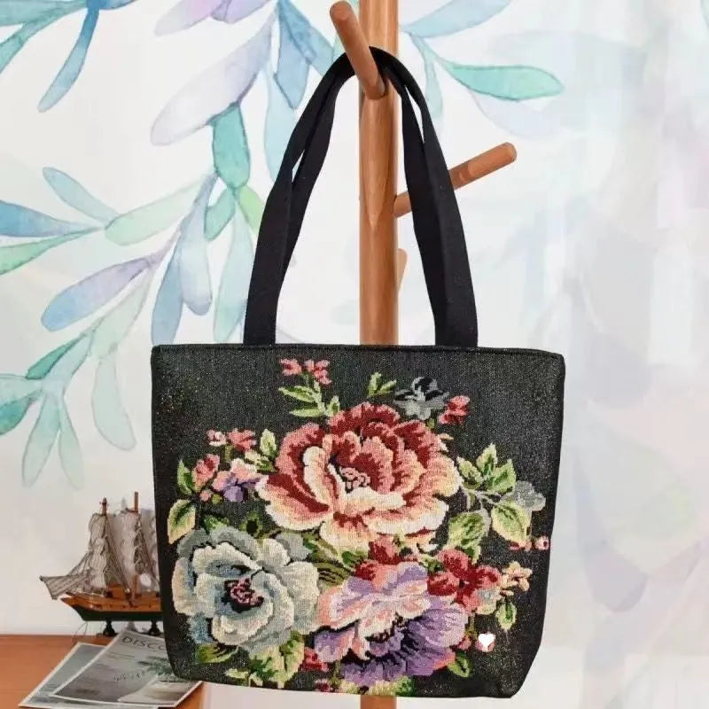 Double-sided gold wire embroidered handheld canvas tote bag in a choice of seven patterns and three sizes.