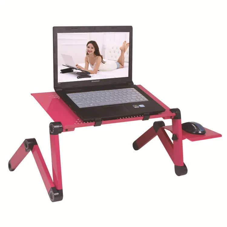 Red folding metal bed desk for laptop with cooling fans, shown in use on a sofa.