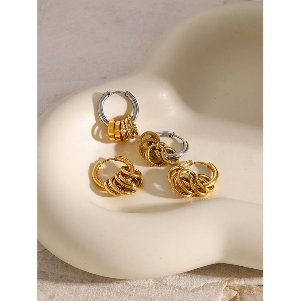 A pair of stainless steel ins style earrings with an electroplated colour finish.