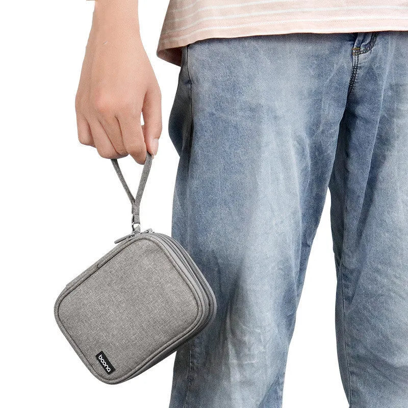Black and grey Oxford cloth protective cases for 2.5-inch portable hard drives.