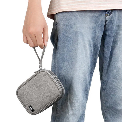 Black and grey Oxford cloth protective cases for 2.5-inch portable hard drives.