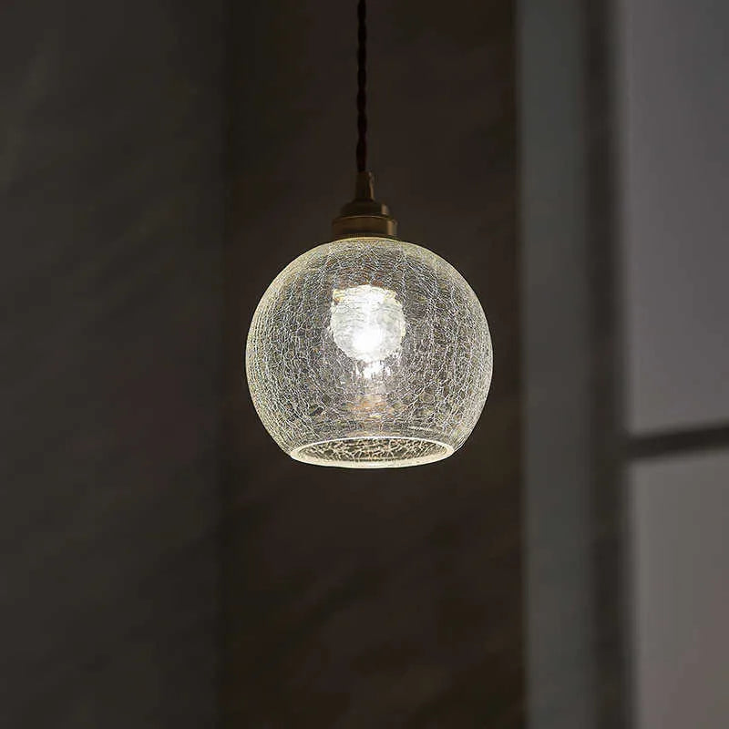Brass and glass ball chandelier ceiling light with copper electroplated finish.