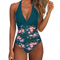 Women's printed one-piece swimsuit with lace-up front and backless gather detail.