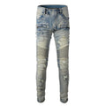 Light blue men's slim fit jeans with hand-frayed distressing on the knees and thighs, featuring a zipper fly and mid-rise waist.
