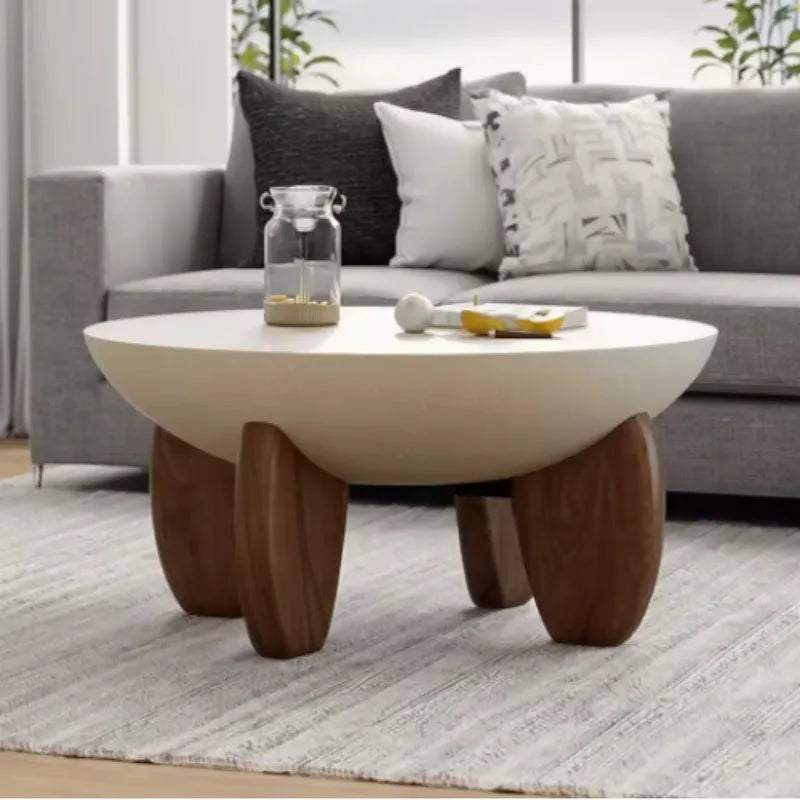 White solid wood coffee table with adjustable legs and storage compartment.