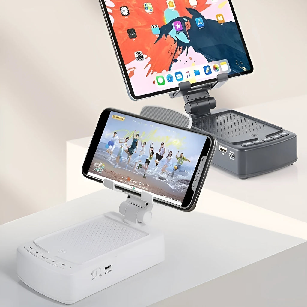 Multifunctional plastic tablet and phone holder with audio in black on a desk