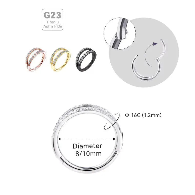 G23 titanium alloy nose ring with zircon accent in steel colour on a grey background.