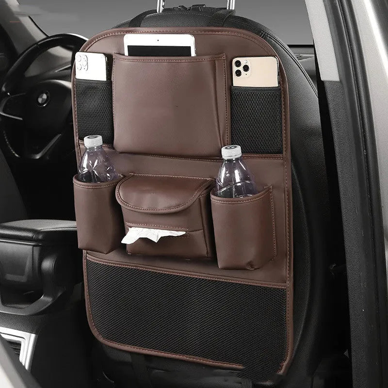 Leather car seat back storage organiser bag shown in black, suspended behind a car seat headrest.