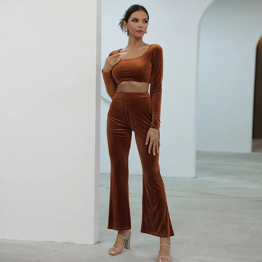 Caramel coloured long sleeve sweater and trousers casual set on a hanger