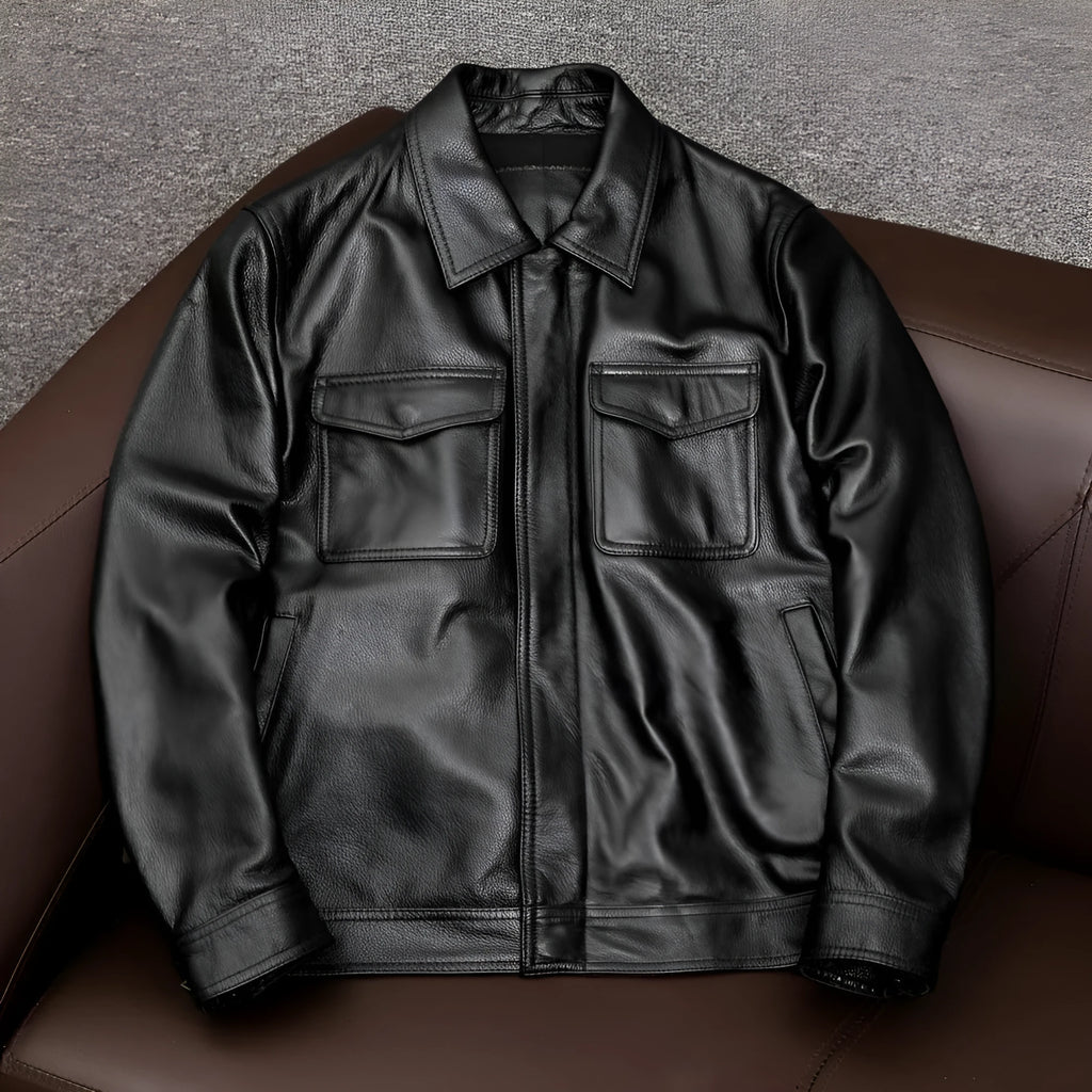 Men's black plus size loose fit PU leather jacket with lapel collar and side pockets.