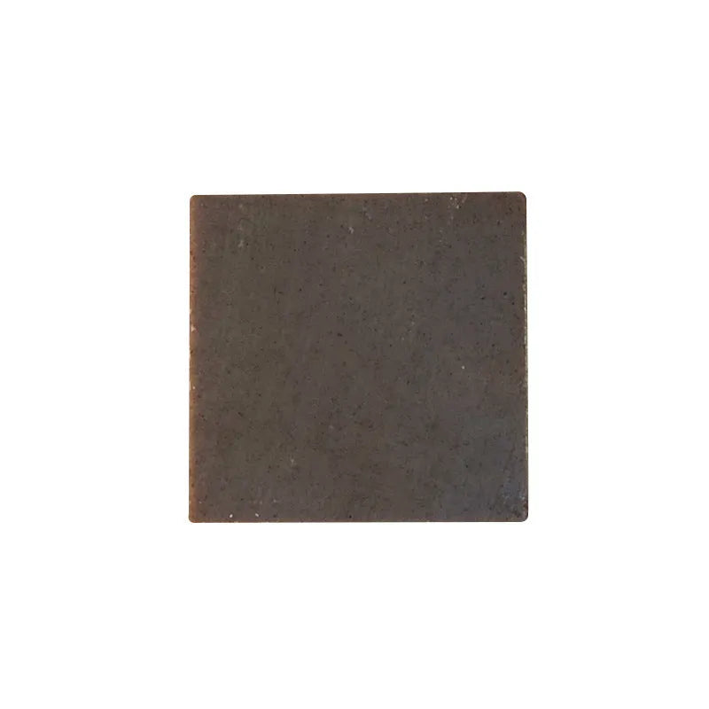A single 72g bar of handmade nine grass cold process shampoo soap, silicone oil-free.
