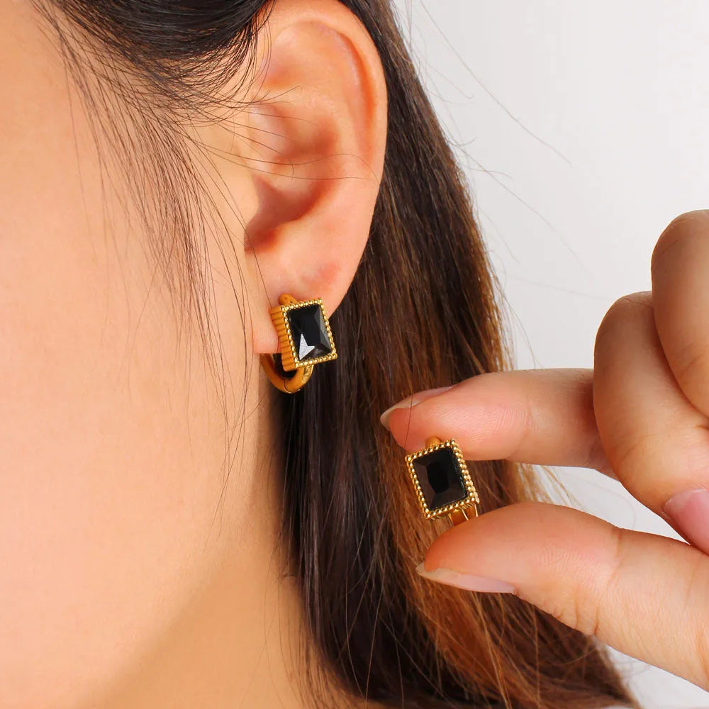 Square geometric stainless steel earrings with a round zircon stone, available in white, black, or green.