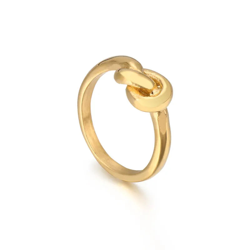 Truelove knot geometric titanium steel ring in gold KR82086-K on white background