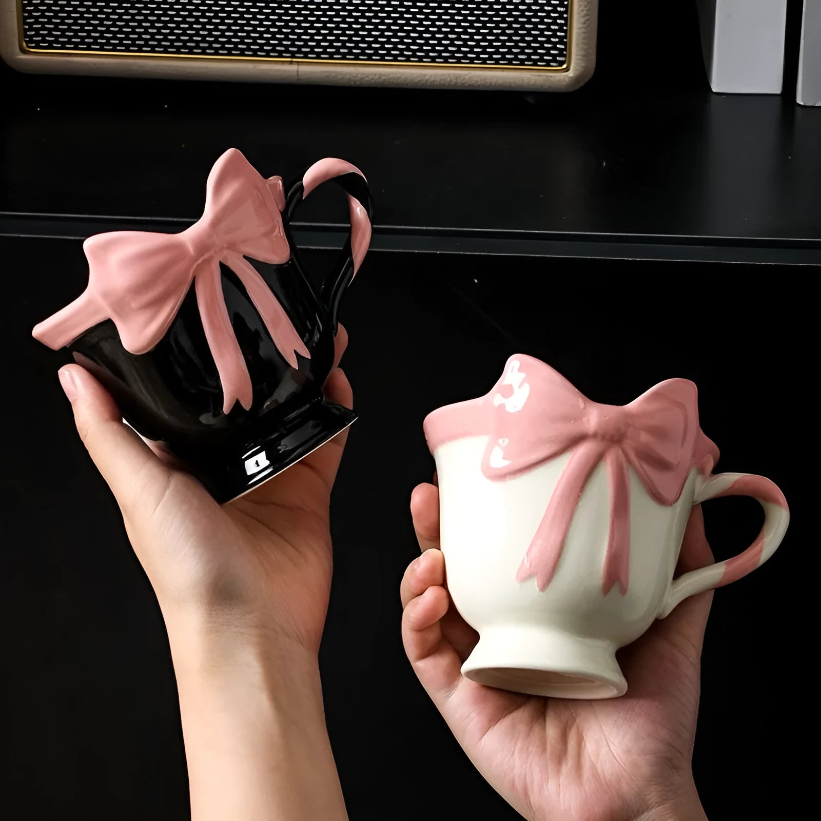 Ceramic mug with a cute girl heart bow design in black pink and white powder colours.