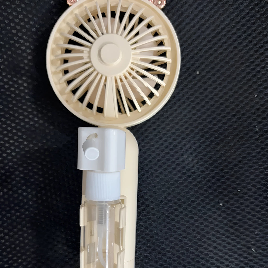 Personalised plastic handheld fan in choice of colours showing name customisation and compact 20cm size.