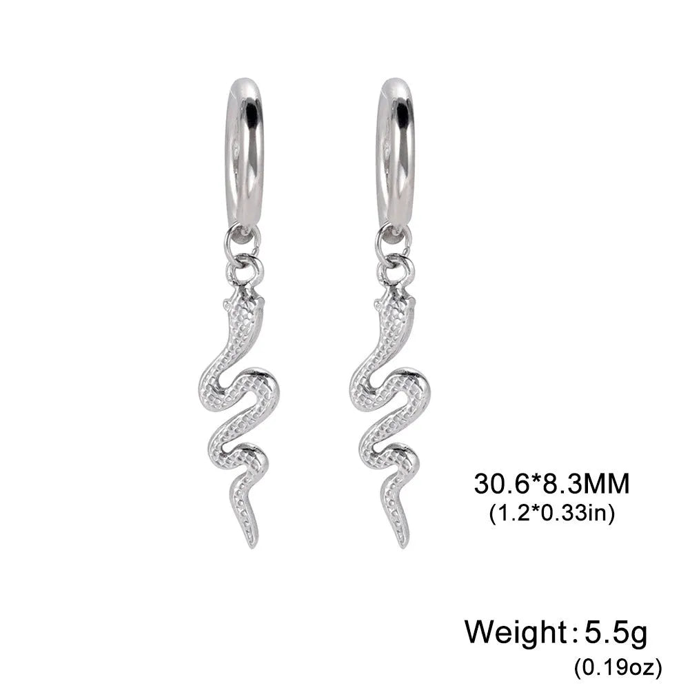 Snake-shaped vintage clip earrings in gold and steel colours