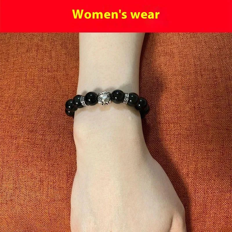 Obsidian bracelet with natural cloud pattern and silver clasp shown in male 12mm and female 10mm sizes.
