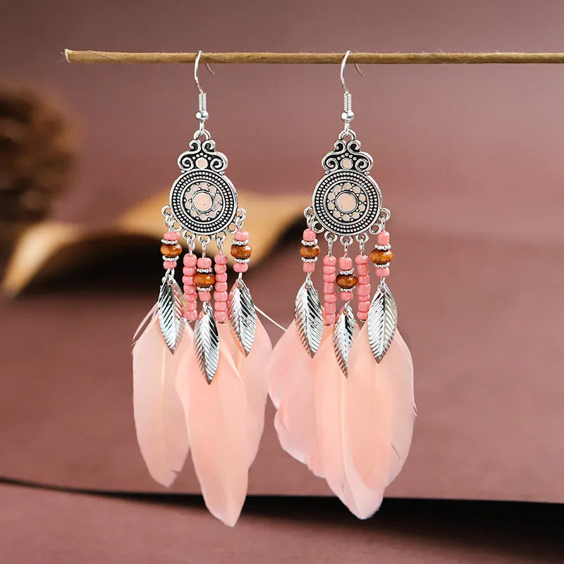 Round drop feather earrings with leaf pattern in alloy metal, available in multiple colours
