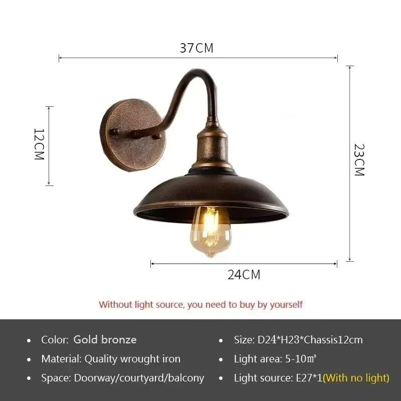 Retro style outdoor wall lamp in a copper finish with an oblique angle mount on a garden wall.