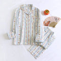 Ladies' cotton gauze two-piece loungewear set with long sleeves and trousers in a stripe print.