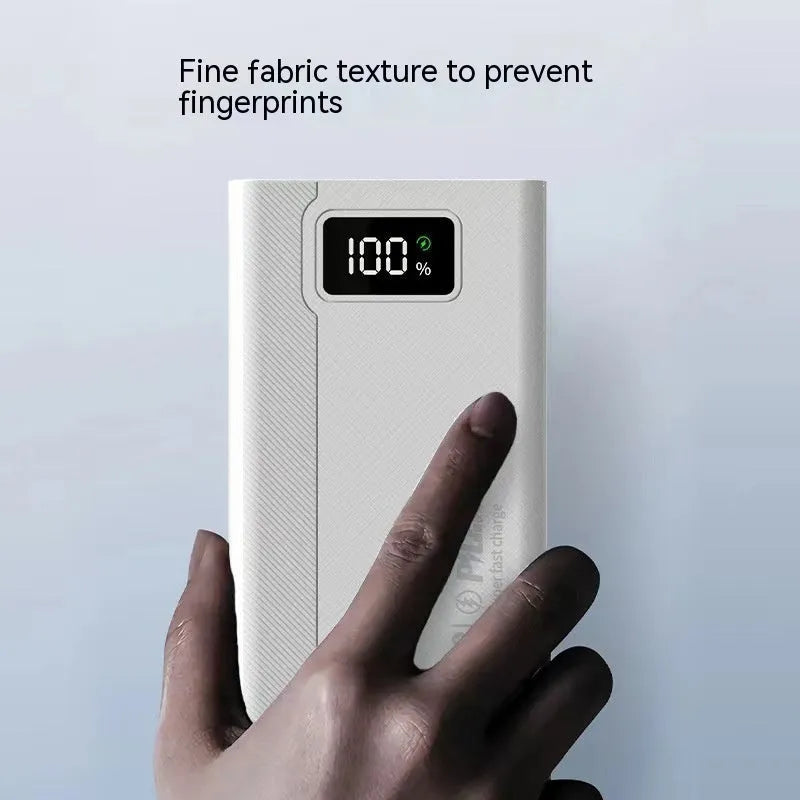 Black and white high capacity power bank showing front view with dimensions