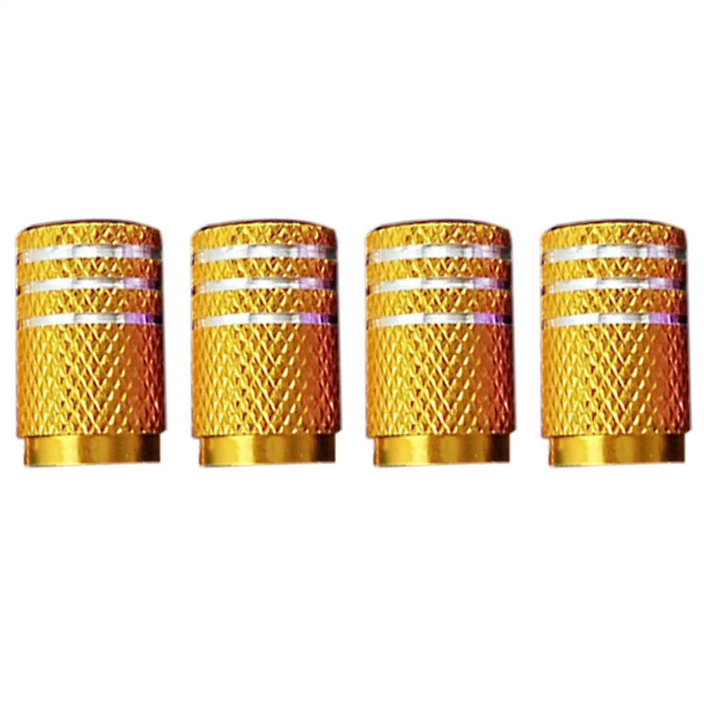Coloured aluminium valve caps for car tyres, shown in yellow, red, purple, blue, green and black