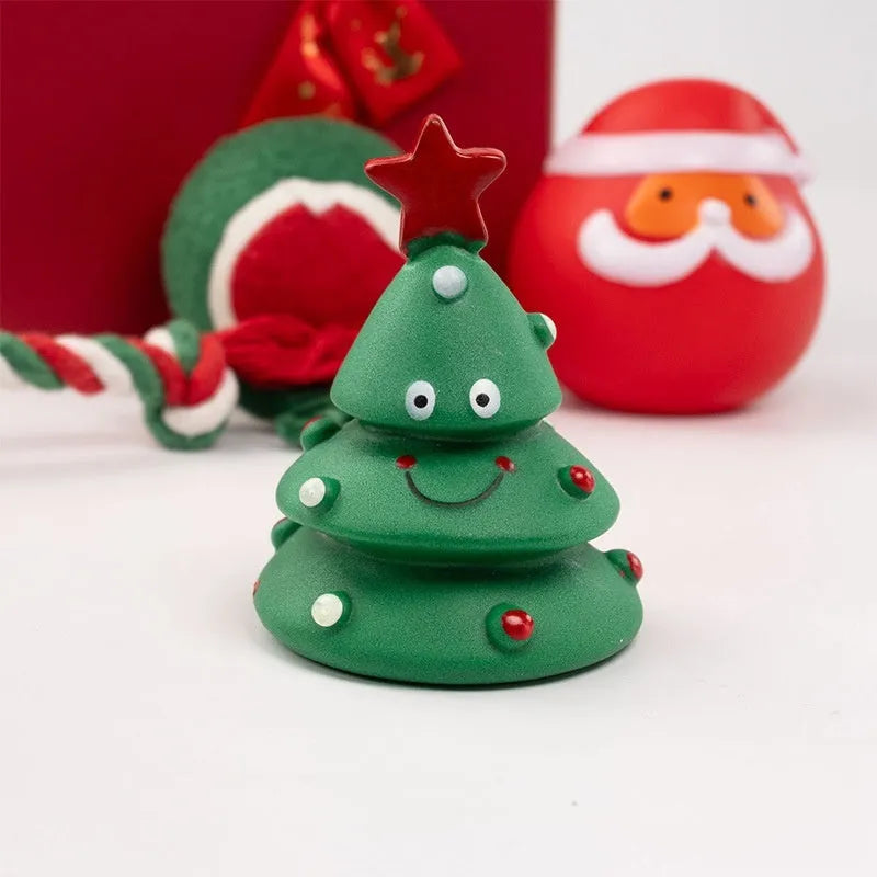 Christmas dog toy set showing vinyl bite-resistant toys in festive shapes including trees, balls, and reindeer