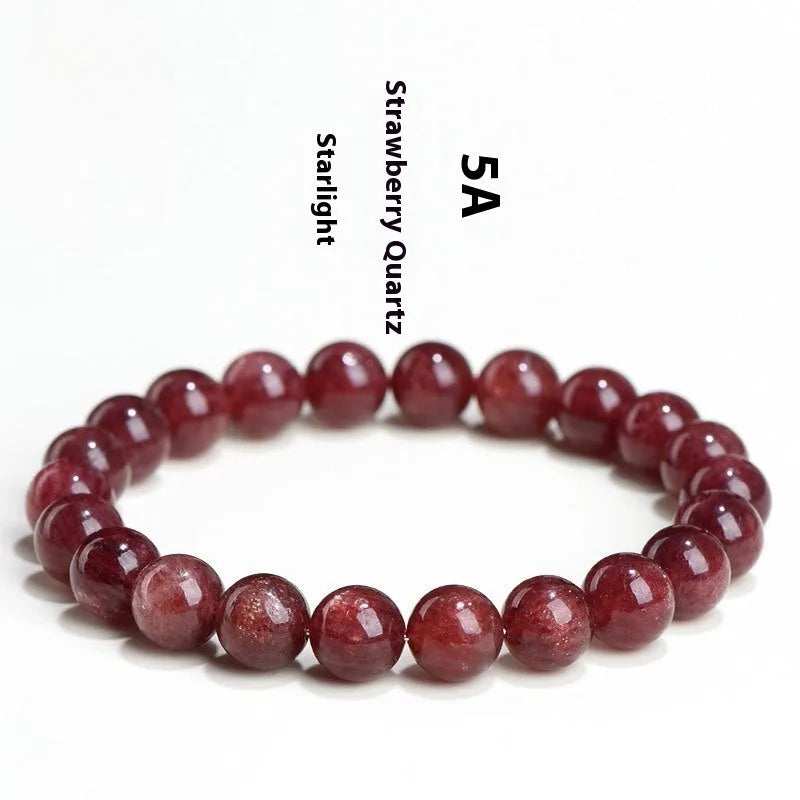 Natural strawberry quartz bracelet showing cherry red colour with starlight effects on geometric beads