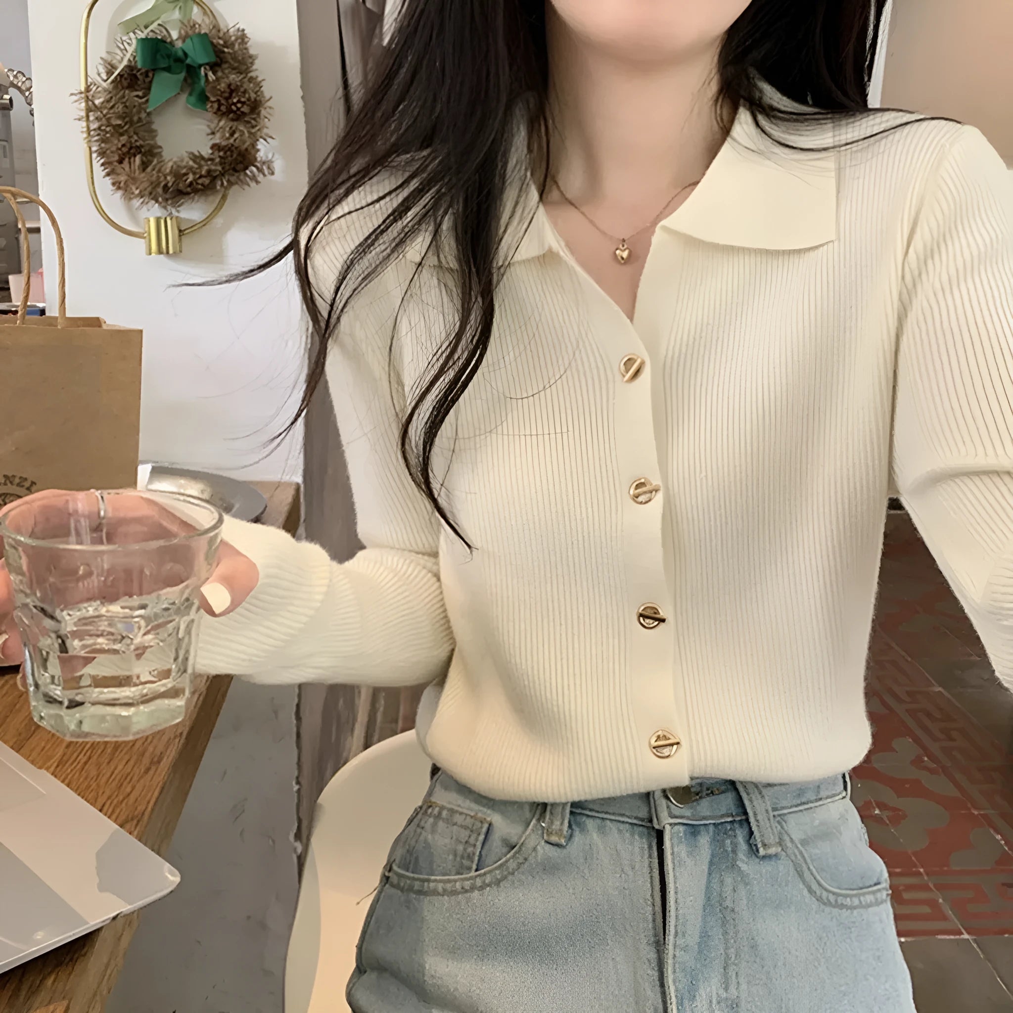 Long-sleeve loose-fit viscose knitted cardigan top in oatmeal colour.