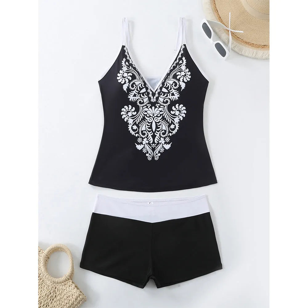 Plus size women's two-piece printed swimsuit in black or rose red with a cotton lining.