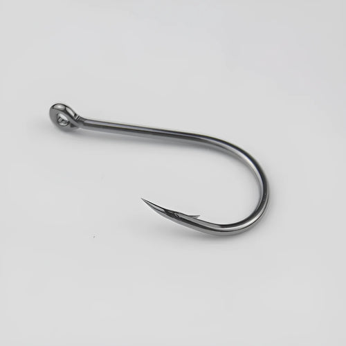 Barbed sea fishing hooks with ring eye and crooked point in a bulk pack for rock and saltwater fishing.