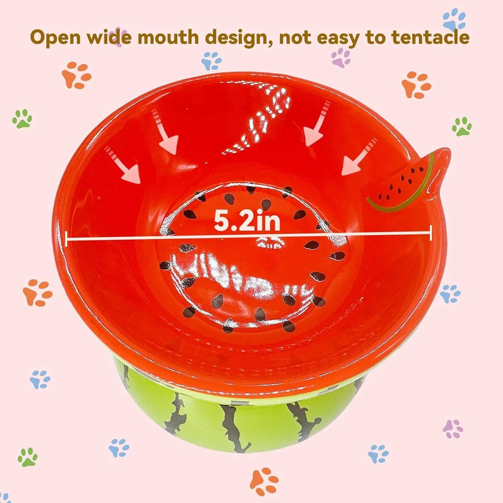 Ceramic raised cat bowl in orange pattern, showing tilted wide dish on non-slip base.