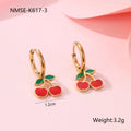 Four-piece cherry jewellery set showing necklace, bracelet, earrings, and ring with 18K electroplated finish