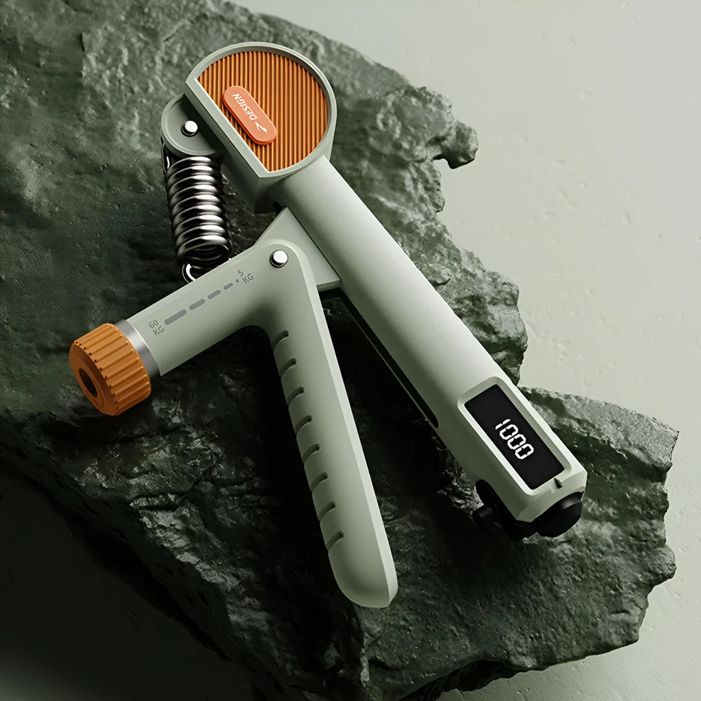Count Spring adjustable hand grip strength trainer in ABS plastic on a plain background.