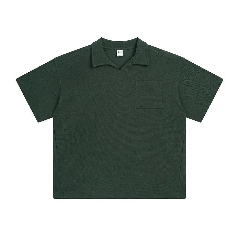 Cotton loose-fit drop-shoulder short sleeve top in Paris forest green, front view, with simple lapel neckline