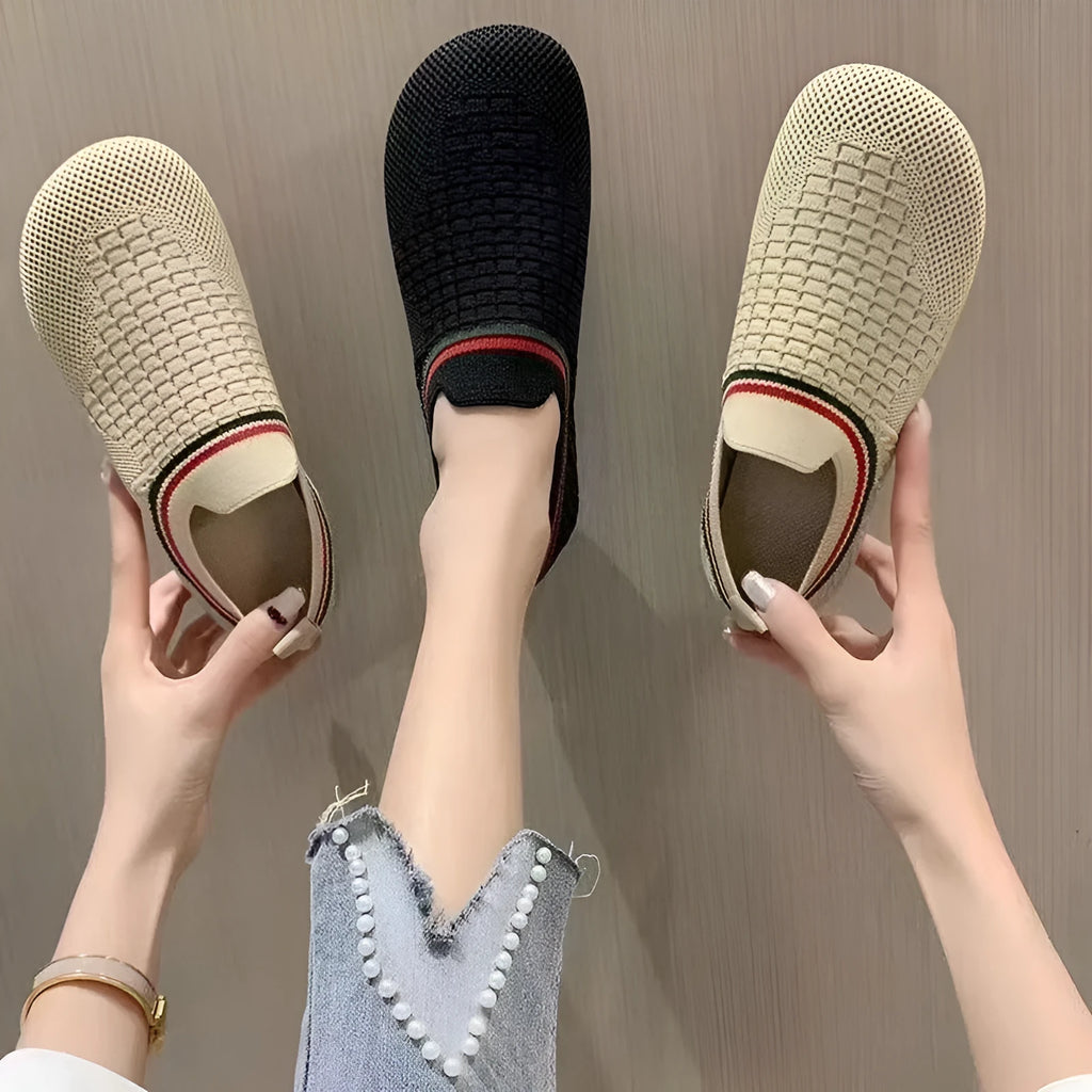 Women's casual slip-on shoes with breathable mesh upper, non-slip rubber sole, low heel, in black