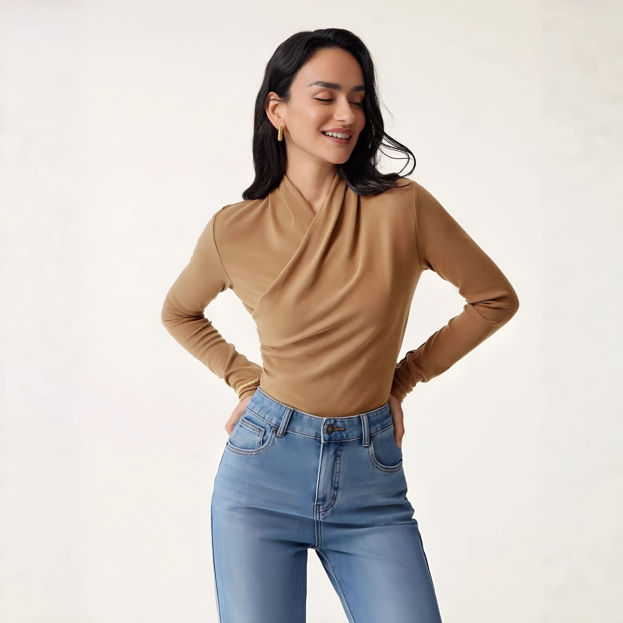 Camel-coloured women's slim fit pullover sweater with long sleeves.
