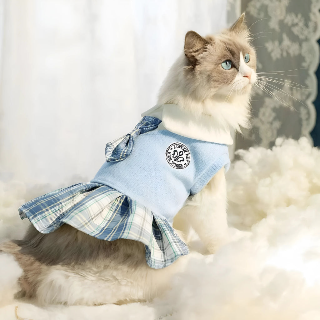 Pink tartan princess skirt for a small dog on a white background